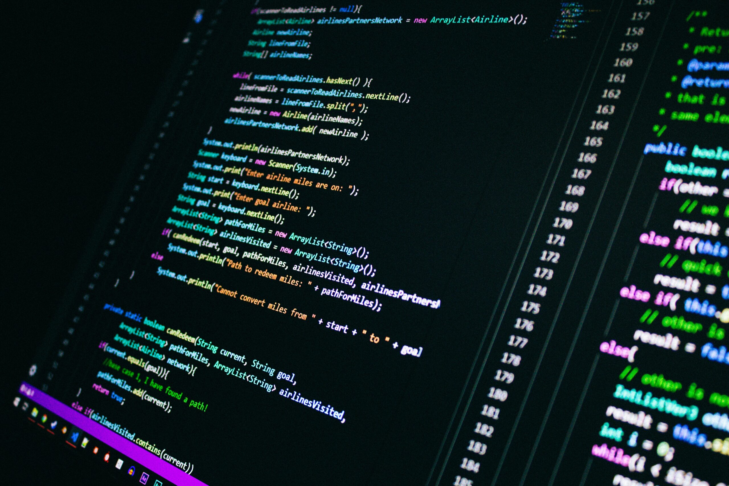 Everything You Need to Know About Java Developer Roles, Responsibilities & Skills Close-up of colorful programming code on a computer screen, showcasing digital technology.
